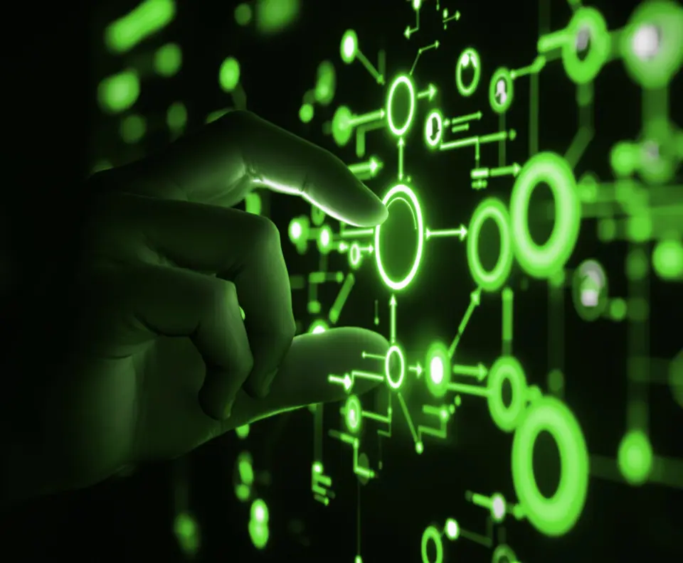 A hand touching a glowing workflow diagram of connected nodes, the kind of automation a marketing automation agency builds